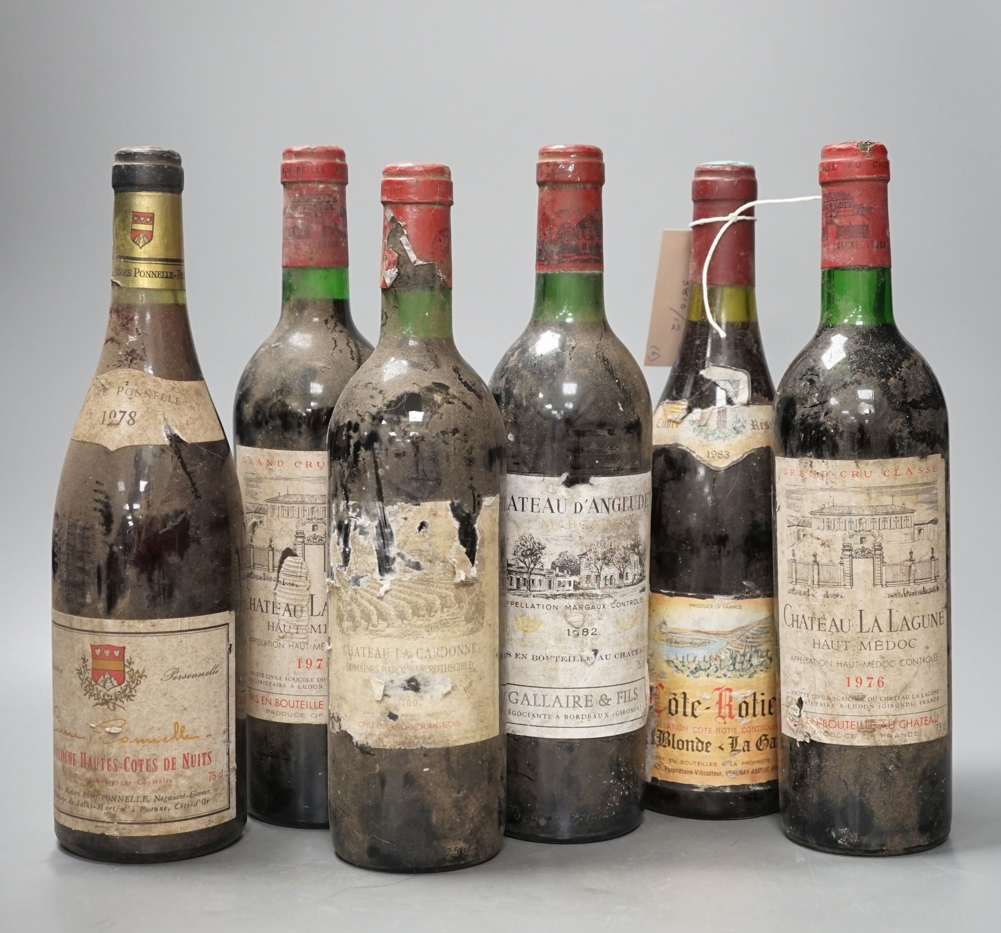 Six various bottles of red wine including two bottles of Château La Lagune 1976 etc.